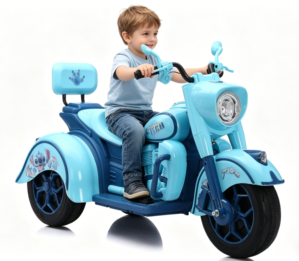 A little boy is riding a child's electric bicycle.